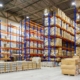 Interior Of A Modern Warehouse Storage Of Retail Shop With Pallet Truck