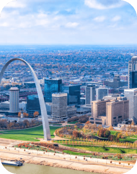 aerial view of st. louis, MO with the arch in the forefront 